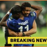 Noni Madueke hugs Wesley Fofana after Chelsea