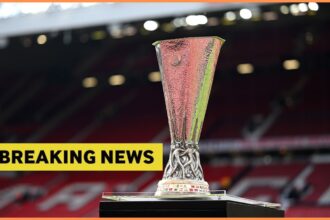 Europa League trophy at Old Trafford, plus yellow