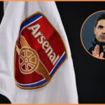 Arsenal logo on flag and manager Mikel Arteta