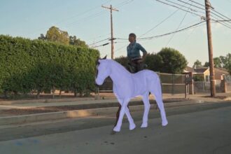 Digital image overlaid on a woman riding a horse.