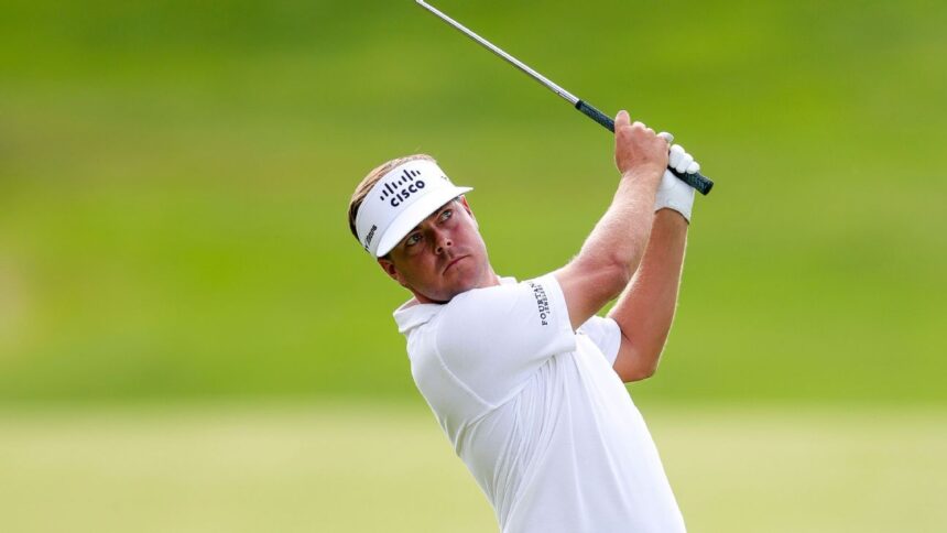 Keith Mitchell leads Trust after 61 course record. Loli 5 bags