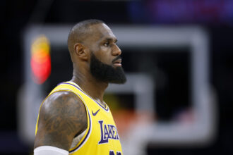 Kendrick Perkins highlights to LeBron James after commenting on the Luca Donchick deal: "Damn...".