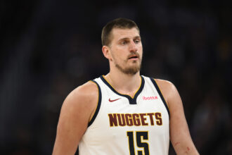 Mike Miller said about what he quickly discovered about Nicola Jokic at his first Nuggets training camp, "It's not closed..."