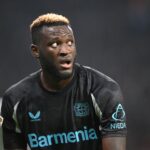 Victor Boniface of Leverkusen looks on