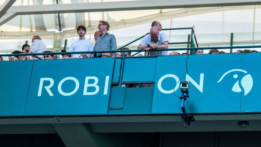 Alexander Zverev supports fan hits for Falling Advertising Board