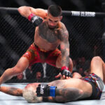 Ilia Topuria knocks out Charles Oliveira at UFC 317