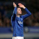 Michael Keane applauds the Everton fans
