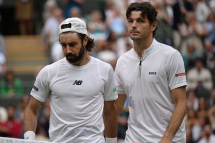 Fritz will reach Wimbledon quarterfinals after Thompson retires