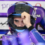 A finger pointing to a round MotoGP rider that is likely to be replaced in 2026
