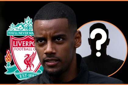 Alexander Isak looks on in front of Liverpool club crest.