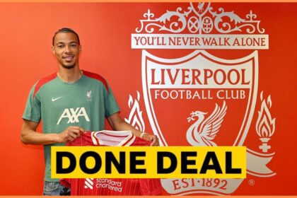 Hugo Ekitike posing with his Liverpool shirt