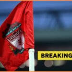 Liverpool FC flag and breaking news banner