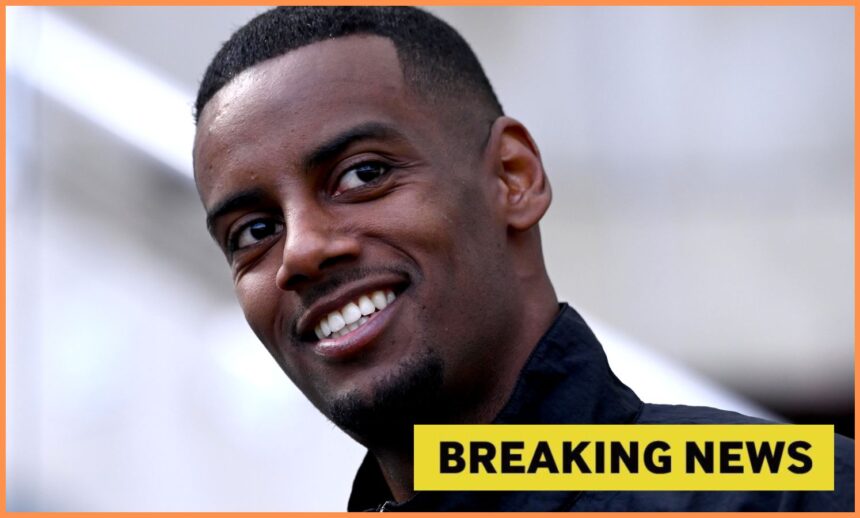 Close-up of Alexander Isak smiling, plus yellow
