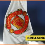 Manchester United corner flag and breaking news banner