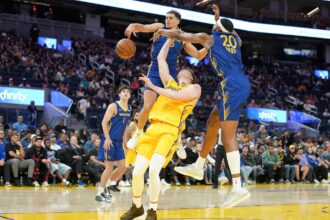 Golden State Warriors fans ring after the Lakers signed the "hidden gem" Summer League star