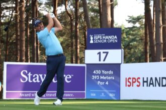 Padraig Harrington holds a two-shot lead in the senior British Open