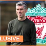 Richard Hughes looks on next to Liverpool club crest.