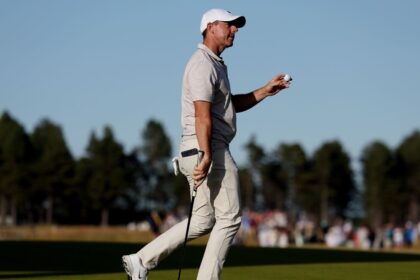 Rory McIlroy Rides Late Surge shares Scotland's open lead with Chris Gotterup