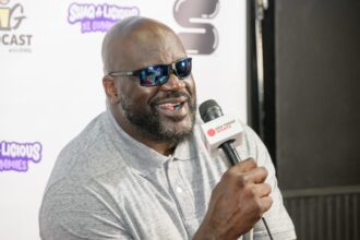 Shaquille O'Neal expressed doubt about Marcus Smart's ability to protect one NBA player, Magic Johnson disagrees