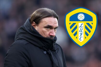 Daniel Farke, Manager of Leeds United, buries his head in his jacket as he looks on