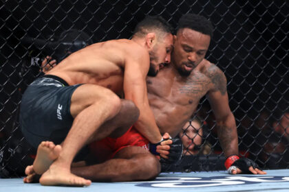 Aaron Pico holds Lerone Murphy at UFC 319