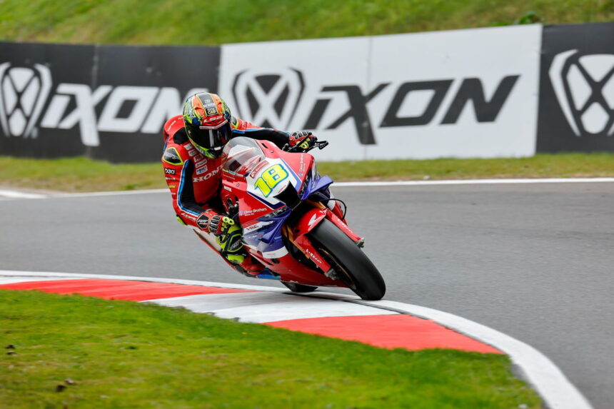 Andrew Irwin praises Honda for "transforming" Honda on the Cadwell Park podium.