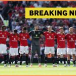Manchester United players lining up, plus yellow
