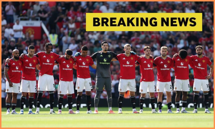 Manchester United players lining up, plus yellow