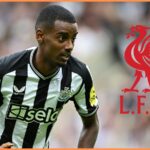 Alexander Isak of Newcastle and the Liverpool FC logo