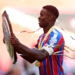 Marc Guehi lifts the Community Shield trophy