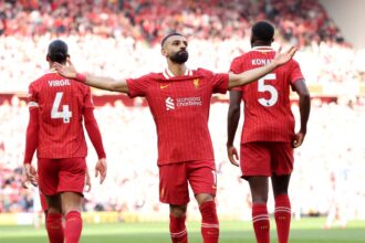Mohamed Salah celebrates scoring as Liverpool beat Tottenham 5-1 at Anfield
