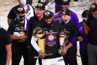 Shannon Sharp responds to the La Lakers title debate for "only reason," with LeBron James responding, "I promise...".