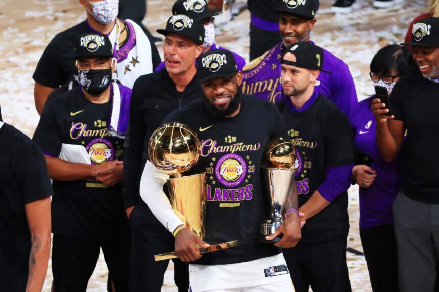 Shannon Sharp responds to the La Lakers title debate for "only reason," with LeBron James responding, "I promise...".
