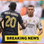 Randal Kolo Muani shakes hands with Kylian Mbappe