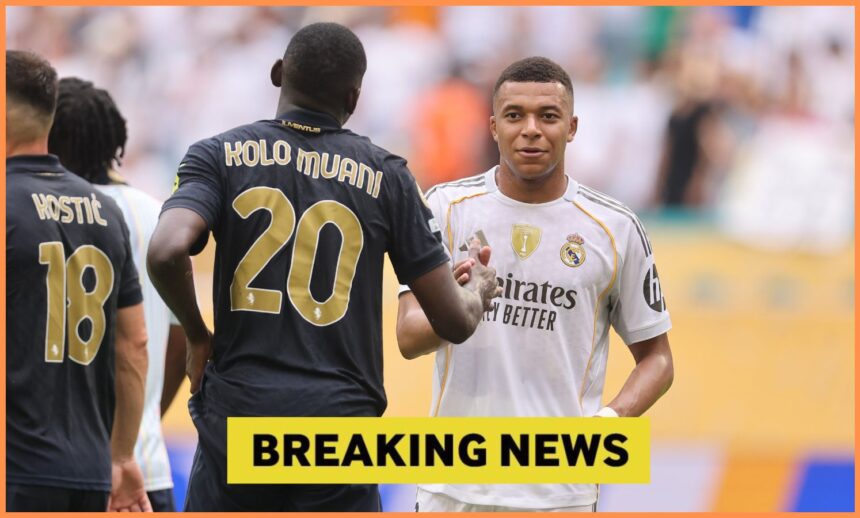 Randal Kolo Muani shakes hands with Kylian Mbappe