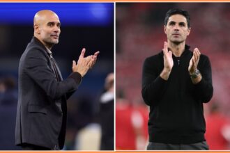Pep Guardiola and Mikel Arteta applauding
