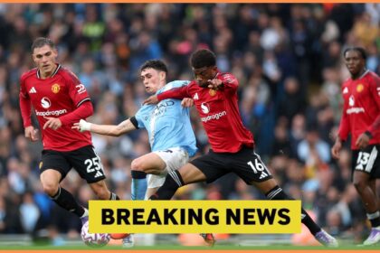 Manuel Ugarte in action for Manchester United against Manchester City
