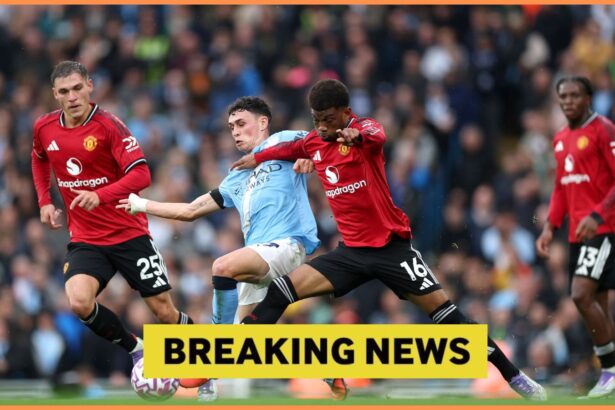 Manuel Ugarte in action for Manchester United against Manchester City