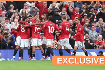 Manchester United players celebrate in the win over Burnley
