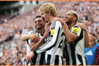 Nick Woltemade celebrates with his Newcastle teammates