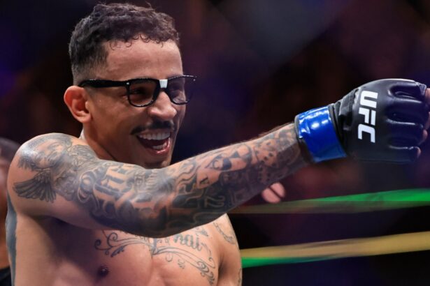 Carlos Prates celebrates after knocking out Geoff Neal at UFC 319