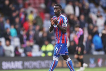 Marc Guehi applauds the Crystal Palace fans