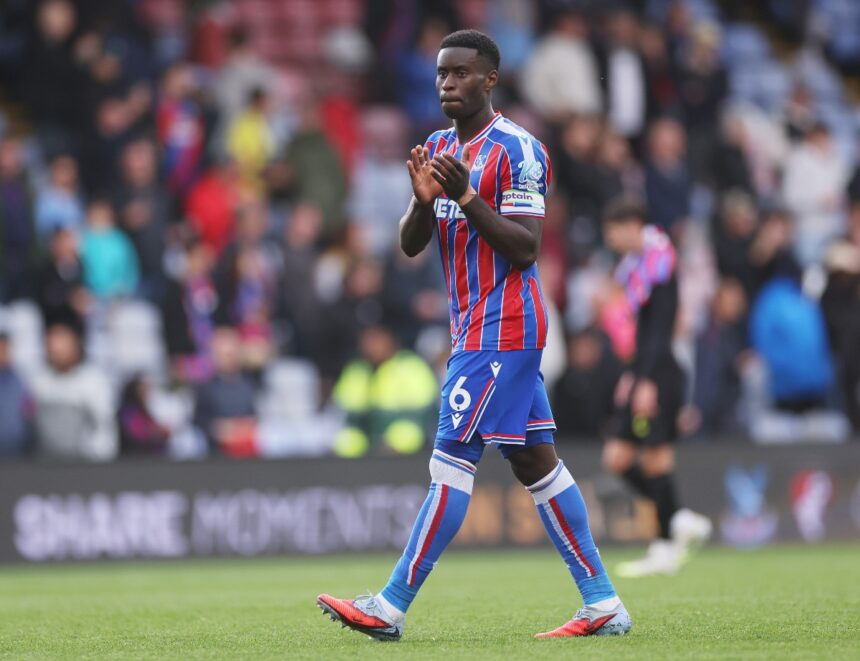 Marc Guehi applauds the Crystal Palace fans