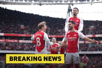 Mikel Merino celebrates with Martin Odegaard and William Saliba