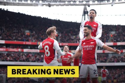 Mikel Merino celebrates with Martin Odegaard and William Saliba