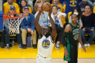 #23 Draymond Green of the Golden State Warriors dunks the ball during the first quarter against #42 Al Horford of the Boston Celtics during Game 5 of the 2022 NBA Finals at Chase Center on June 13, 2022 in San Francisco, California.
