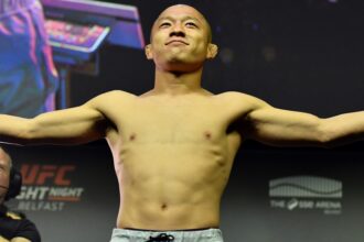 Kyoji Horiguchi poses on the scale during the UFC Belfast ceremonial weigh-in