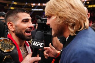 Ilia Topuria and Paddy Pimblett face off inside the Octagon at UFC 317