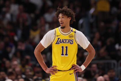Jackson Hayes, No. 11 of the Los Angeles Lakers, watches the first half of the game against the Chicago Bulls at the United Center.