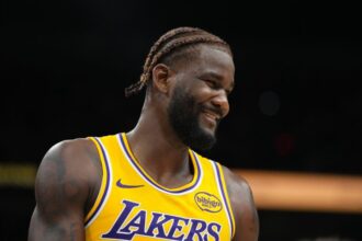 Los Angeles Lakers No. 5 Deandre Ayton watches the first half of a preseason NBA game against the Phoenix Suns at Mortgage Matchup Center.